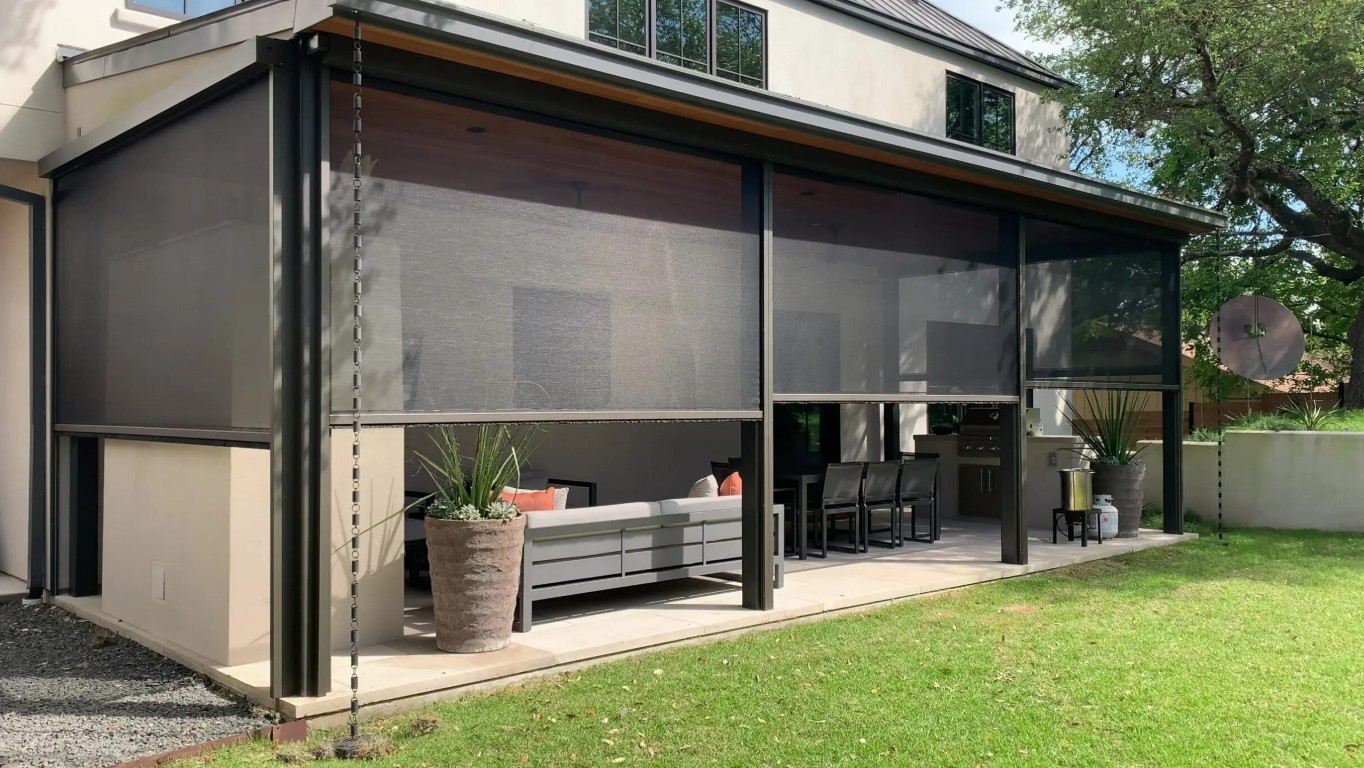 Modern patio enclosure with retractable screens for bug-free outdoor living in Buckeye, AZ