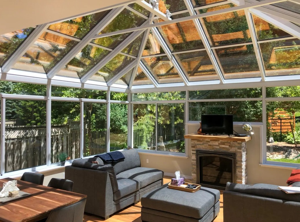 Bright sunroom interior with comfortable seating and glass ceiling in Buckeye, AZ